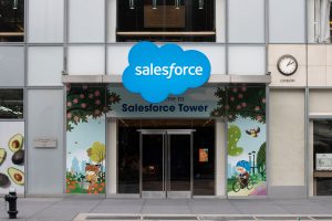 Entrance of Salesforce Tower with logo overhead, representing Left Main REI's CRM built on Salesforce